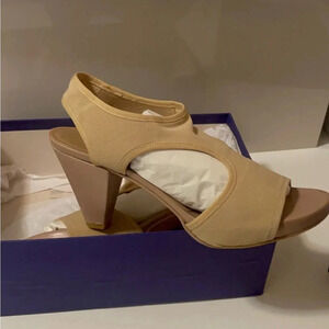 Stuart weitzmen soft starchy sandal with strong sole and heels chic and comfy